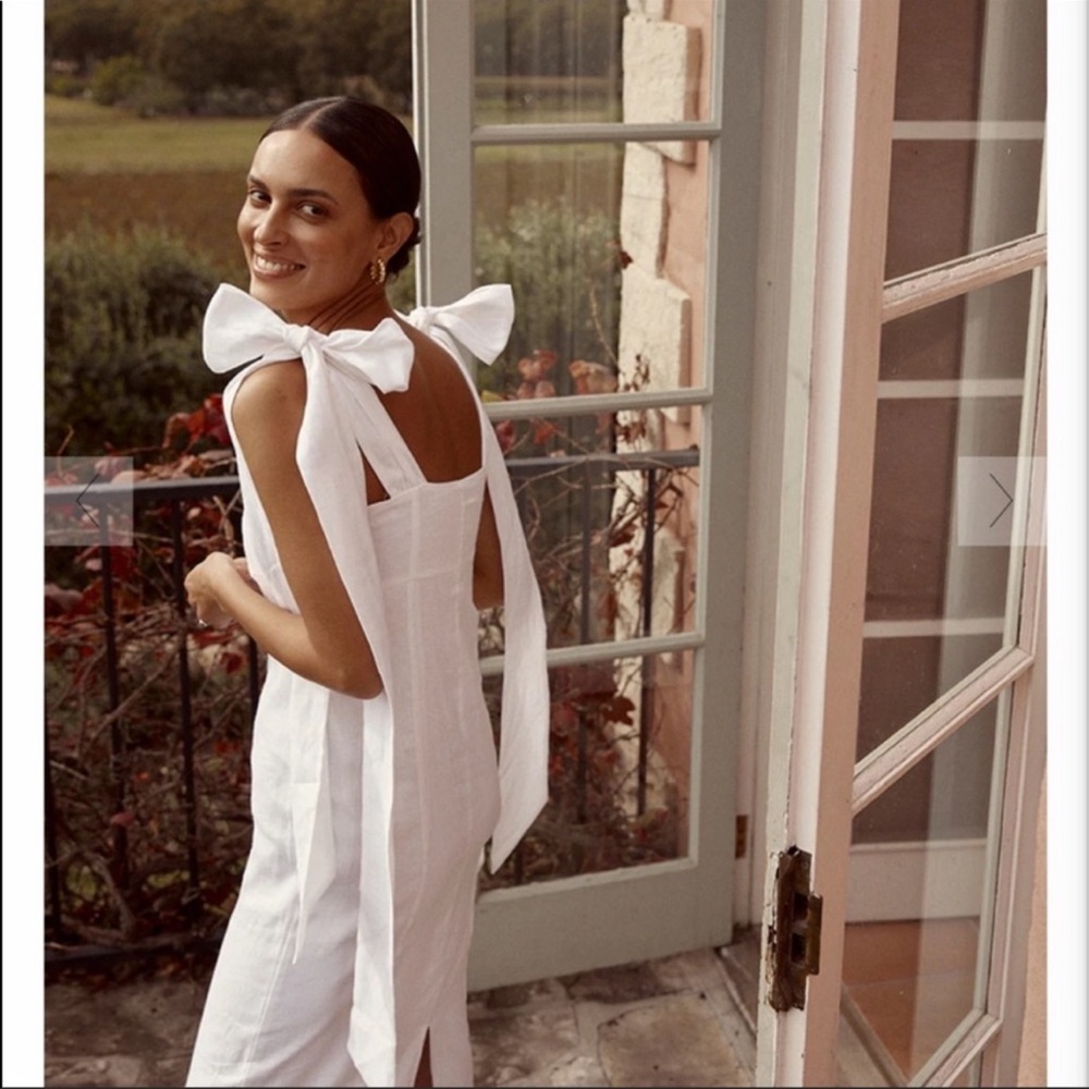 Dissh linen dress with bows. Size 4.